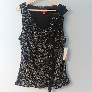 Ruffled sleeveless blouse